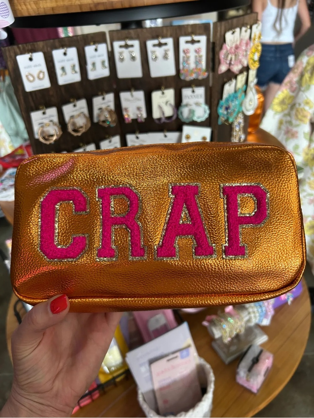 Metallic Orange Cosmetic Pouch with Pink Lettering
